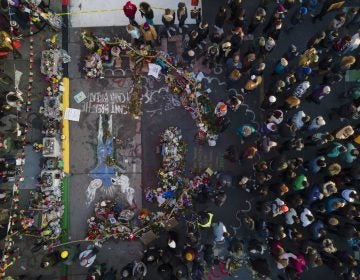 A crowd gathers next to the spot where George Floyd was murdered at George Floyd Square after a guilty verdict was announced at the trial of former Minneapolis police Officer Derek Chauvin