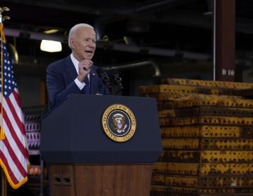 President Joe Biden delivers a speech from a podium