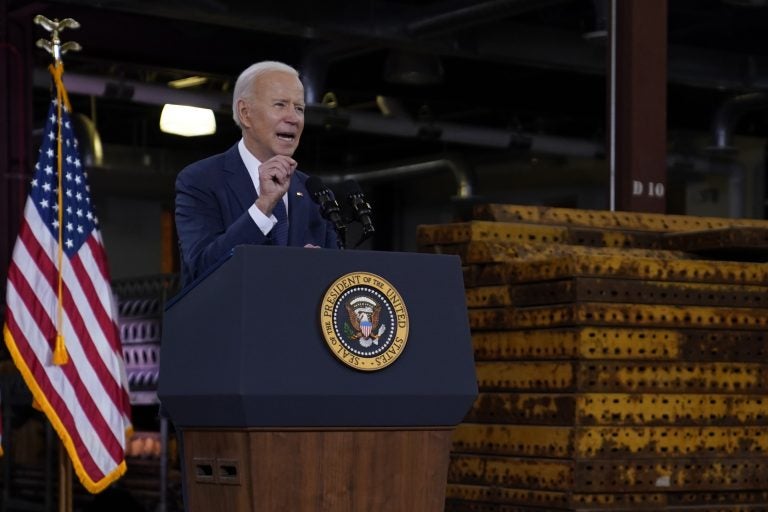 President Joe Biden delivers a speech from a podium