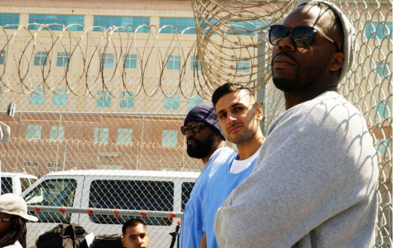 Adnan Khan (middle) spent 16 years of his life in California prisons until he was released in 2019 under a re-sentencing bill he helped create while behind bars. Now he's an advocate on behalf of incarcerated people. (Courtesy of Adnan Khan)