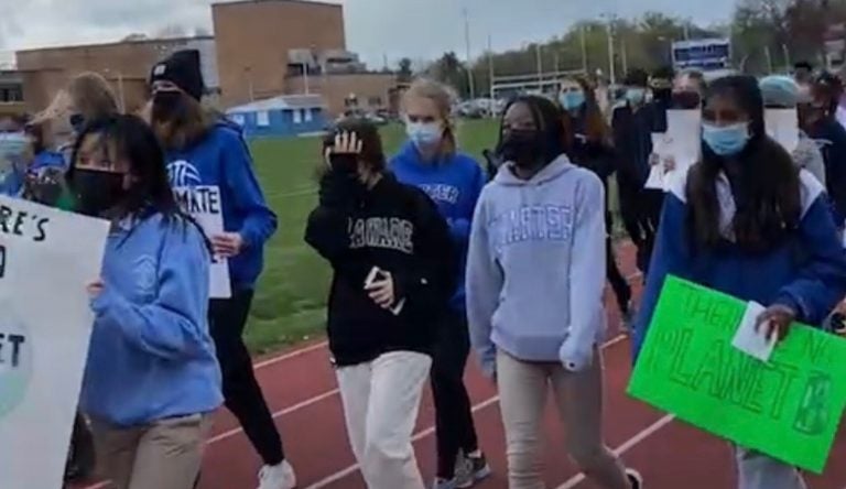 Charter School of Wilmington students march following an Earth Day rally in support of a Green Amendment to Delaware's Constitution.