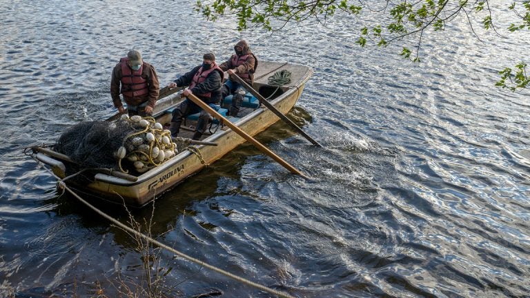 Steve Meserve and others row the Delaware River