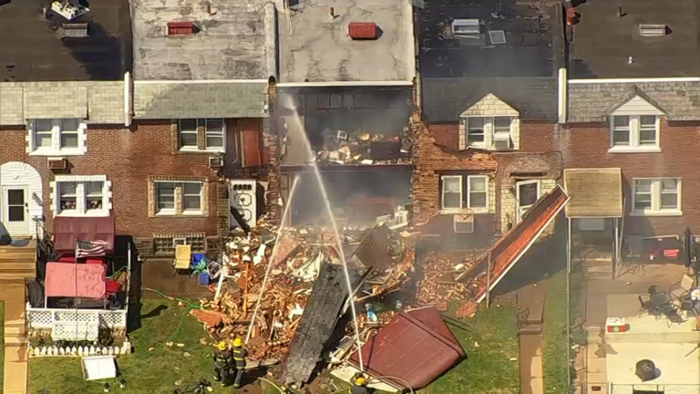 The scene of an apparent explosion at a Tacony home.