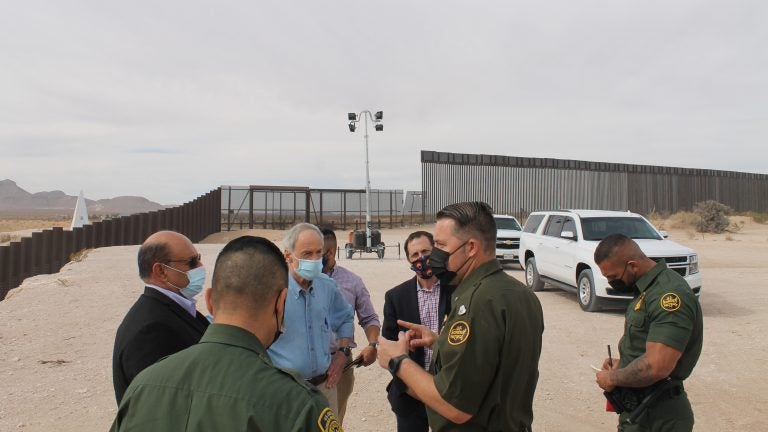 U.S. Sen. Tom Carper (in blue) of Delaware talks with members U.S. Border Patrol near El Paso, Texas. (courtesy Carper's office)