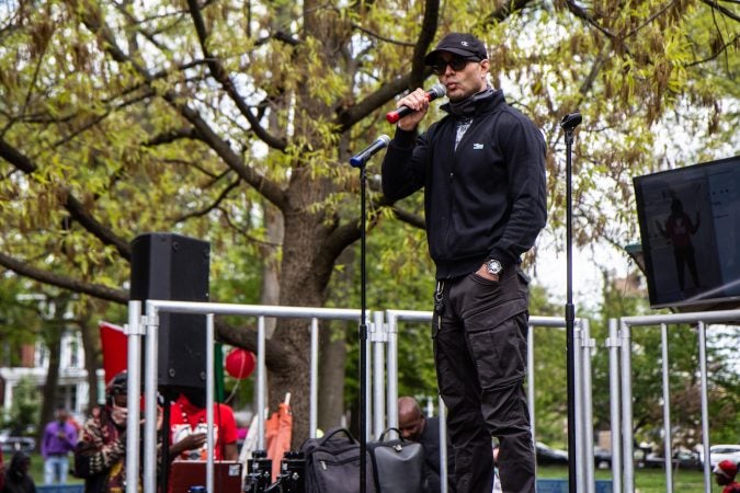 Activist Robert Saleem Holbrook speaks to a crowd