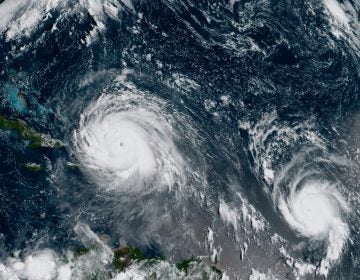 A satellite image from September 2017 shows Hurricane Irma, left, and Hurricane Jose, right, in the Atlantic Ocean. NOAA says the average annual number of tropical storms in the Atlantic has slightly increased. (NOAA/GOES-16/AP)