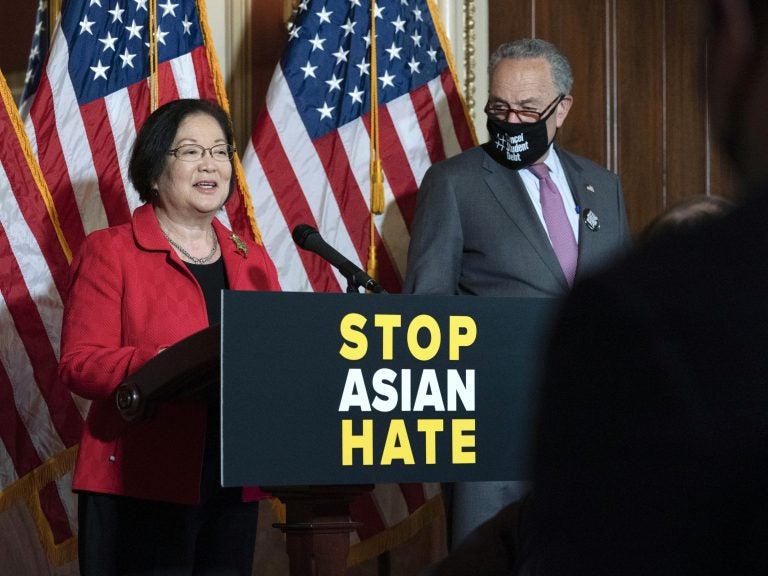 Sen. Mazie Hirono, D-Hawaii, accompanied by Senate Majority Leader Chuck Schumer, D-N.Y., speaks during a news conference in Washington on April 13. (Jose Luis Magana/AP Photo)