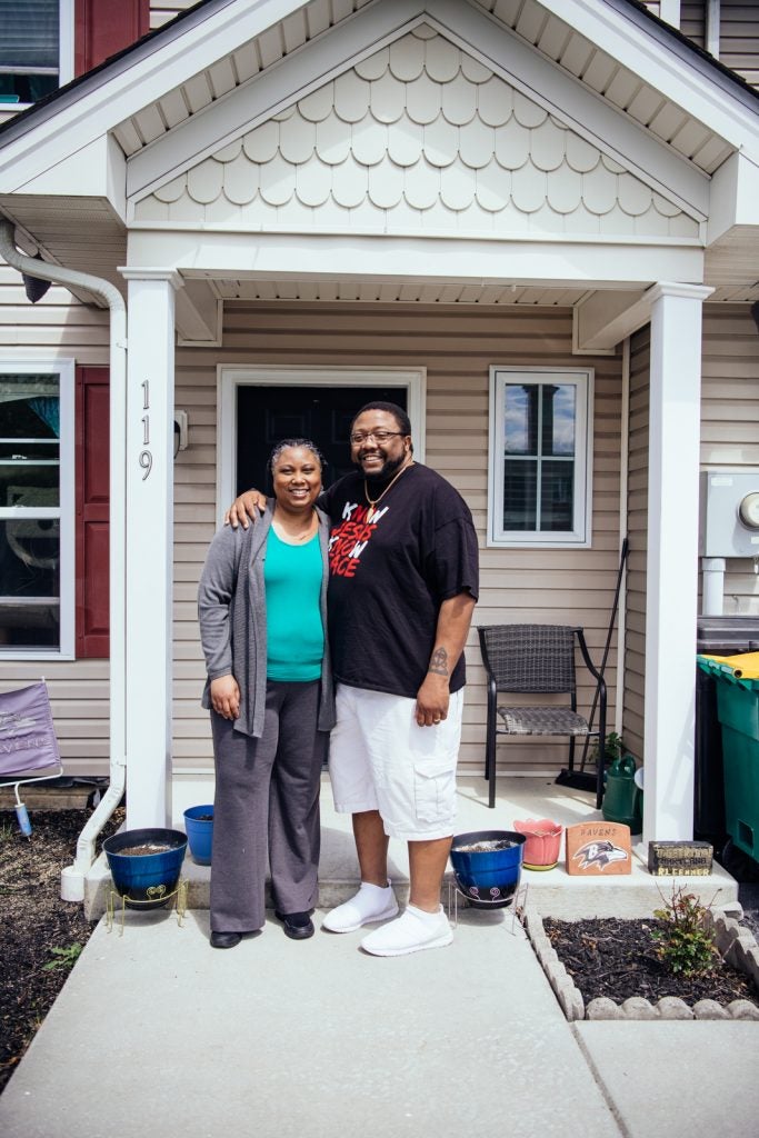 Marcia and Jonathan Pretlow outside of their home