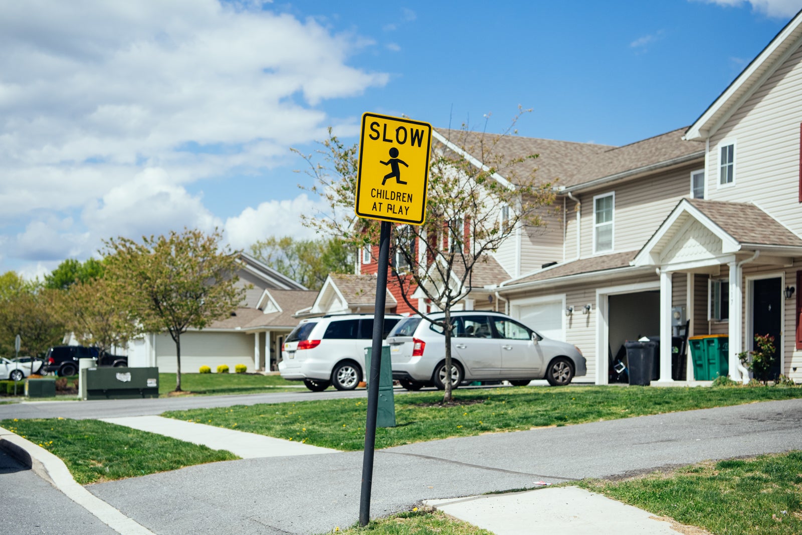 A "Slow: Children at Play" sign is pictured outside Redwood Park Townhomes