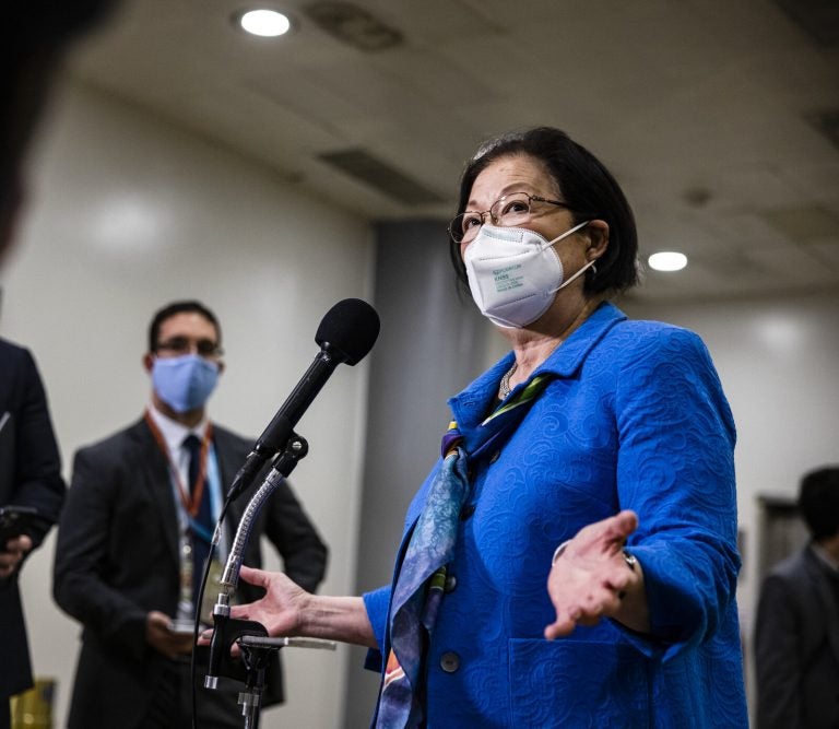 Sen. Mazie Hirono speaks into a mic at the Capitol