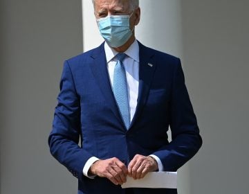 President Biden looks on after speaking during an event about gun violence prevention in the Rose Garden of the White House on April 8.