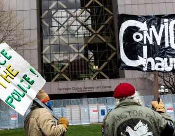 People gather outside the Hennepin County Courthouse in Minneapolis on Tuesday before the jury's decision returning guilty verdicts against former police officer Derek Chauvin. (Kerem Yucel/AFP via Getty Images)