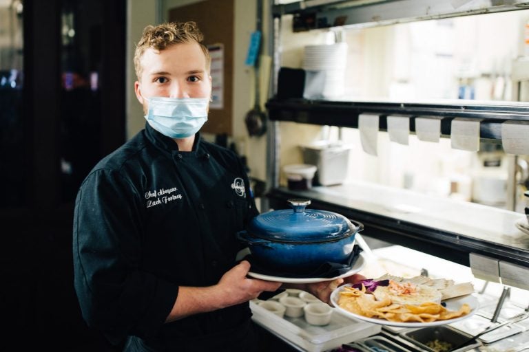 Chef Zach Fortney at The Belvedere Inn stands for a portrait. (Kate Landis/WITF)