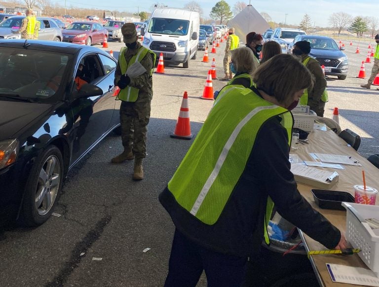 Medical Reserve Corps members work with the National Guard and state public health employees in giving vaccinations at Delaware's mass events, like this one at Dover International Speedway. (Courtesy of Mary Kampman)