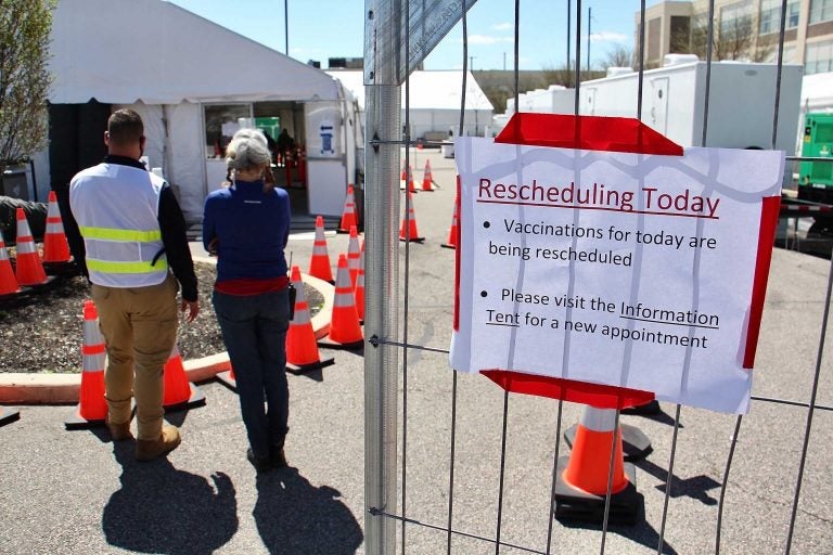 A sign indicates that Philly's FEMA vaccination site is rescheduling appointments Tuesday