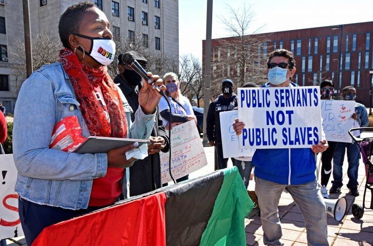 Activist Ronsha Dickerson addresses a rally in front of Camden's City Hall on March 20, 2021, organized to protest the Democratic machine's quick decision to endorse current city coucillman Vic Carstarphen for mayor following Mayor Frank Moran's resignation. (Photo by April Saul for WHYY)