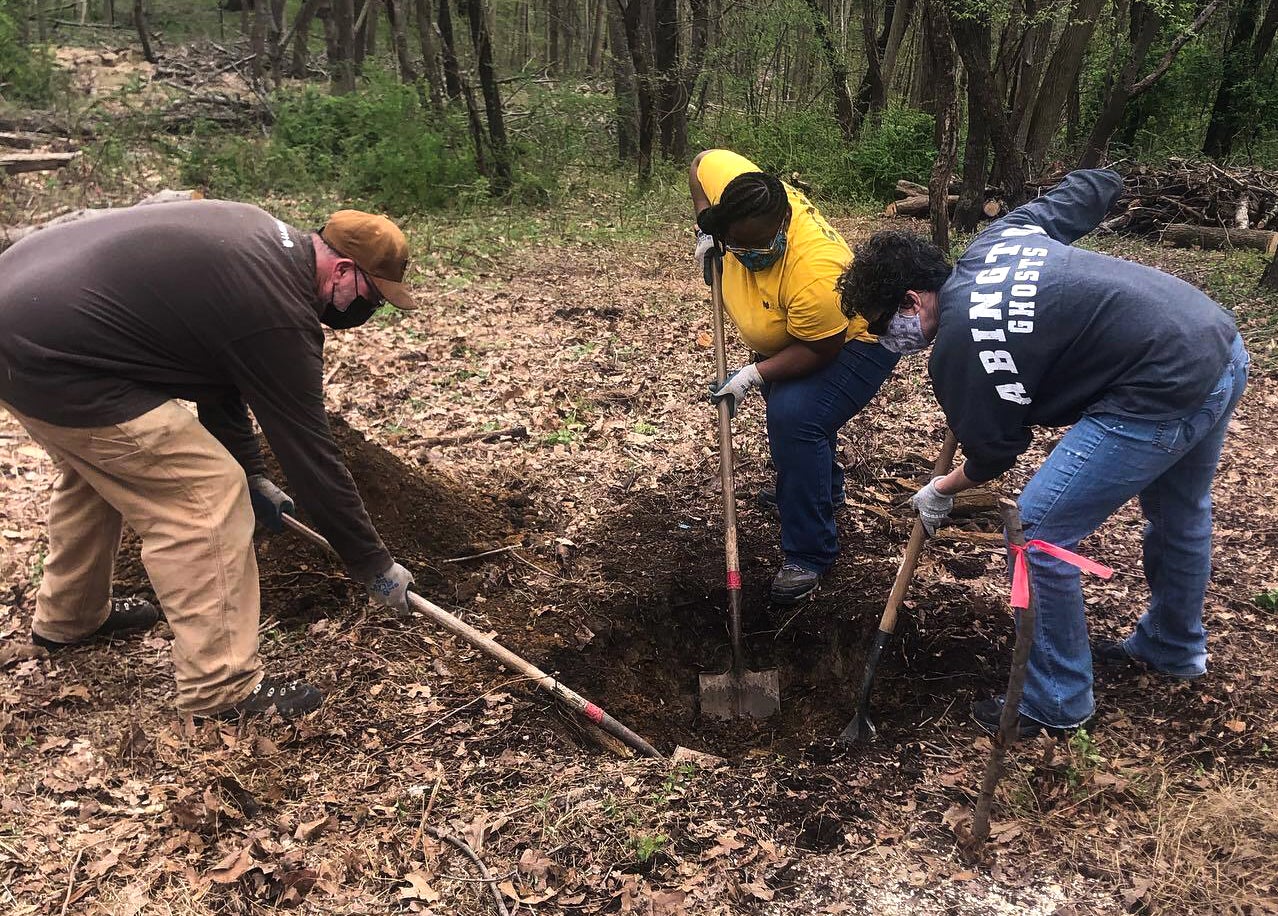 Volunteers with the Schuylkill Center for Environmental Education help outdoors