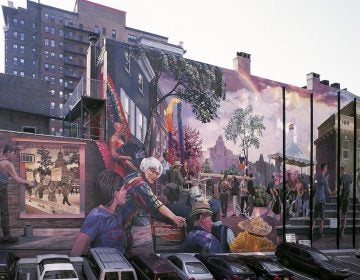 A mural on the side of The William Way Center is visible.