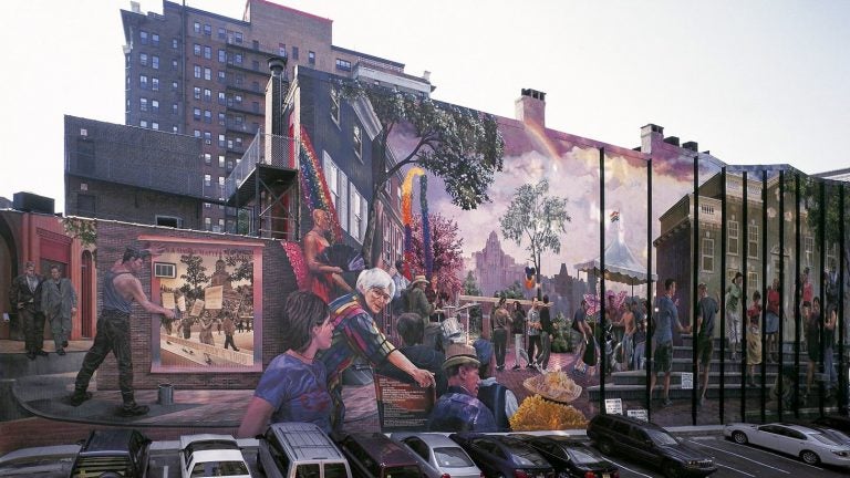 A mural on the side of The William Way Center is visible.