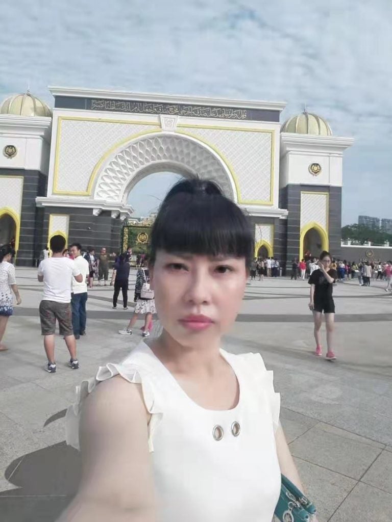 A selfie Feng Daoyou took in Macau. Her older brother Feng Daokun believes she traveled to Hong Kong before flying to the U.S., from where she first contacted him in 2016. Unlike the rest of her family, she did not marry, and seemed to relish venturing far from home. 