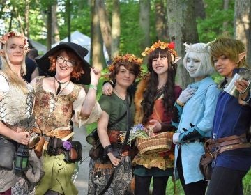 A group of people dressed up in costumes at the New Jersey Renaissance Faire