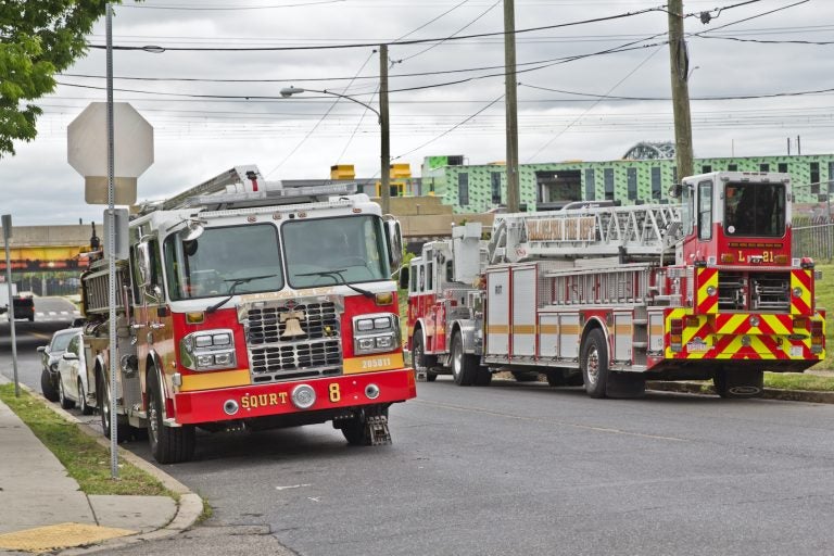 Fire trucks parked on Magee Street