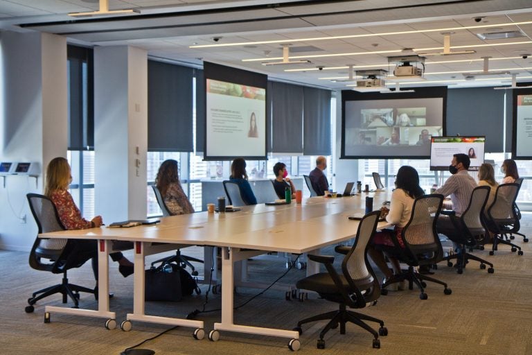 FMC employees participate in a teleconference