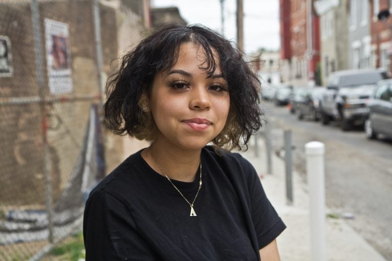 Ashanti Ortiz, 18, is a senior at Kensington Health Sciences Academy and also works at Uniqlo. (Kimberly Paynter/WHYY)