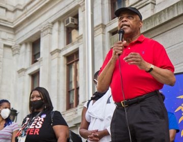 Jerry Jordan, president of the Philadelphia Federation of Teachers, spoke of education woes like toxic school buildings and overcrowding at a vigil for George Floyd on the one-year anniversary of his death outside Philadelphia’s City Hall on May 25, 2021. (Kimberly Paynter/WHYY)