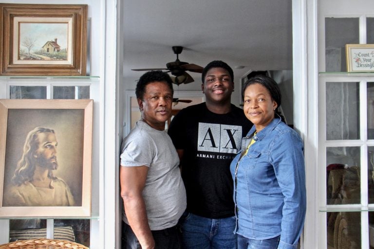 Clive and Oneita Thompson, with their son, Timothy, inside their West Philly home