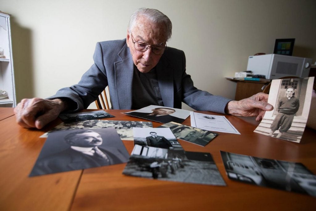 Ken Brady, now 99, was taken in by the Milton Hershey School during the Depression, after his father died. Milton Hershey handed Brady his diploma when he graduated. Today, he marvels at the size of the school’s fortune and wonders if it could do more. (Charles Fox/The Inquirer)