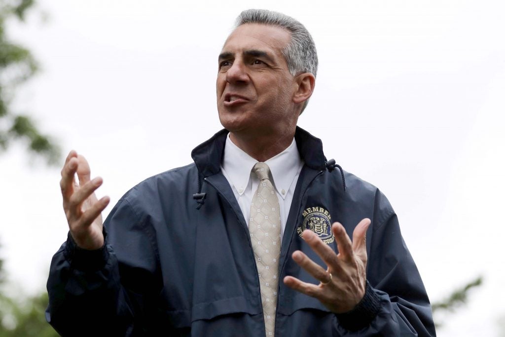 In this Monday, May 29, 2017, file photo, New Jersey Assemblyman Jack Ciattarelli, who is a Republican candidate in the gubernatorial primary election, speaks to a crowd during a Memorial Day observance, in Bridgewater, N.J. (AP Photo/Julio Cortez)