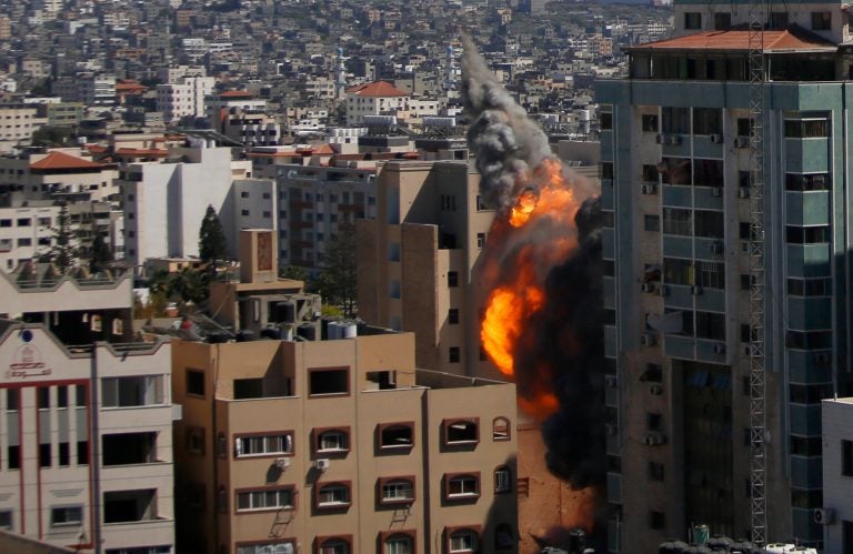 An Israeli airstrike hits the high-rise building housing The Associated Press’ offices in Gaza City, Saturday, May 15, 2021. The airstrike Saturday came roughly an hour after the Israeli military ordered people to evacuate the building. There was no immediate explanation for why the building was targeted. The building housed The Associated Press, Al-Jazeera and a number of offices and apartment. (AP Photo/Hatem Moussa)