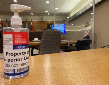 Plastic sheeting surrounds every juror's chair and separates tables for attorneys at the Leonard L. Williams Justice Center in downtown Wilmington as Delaware's courts prepare to resume criminal jury trials that had been on hold since March 2020. (Mark Eichmann/WHYY)