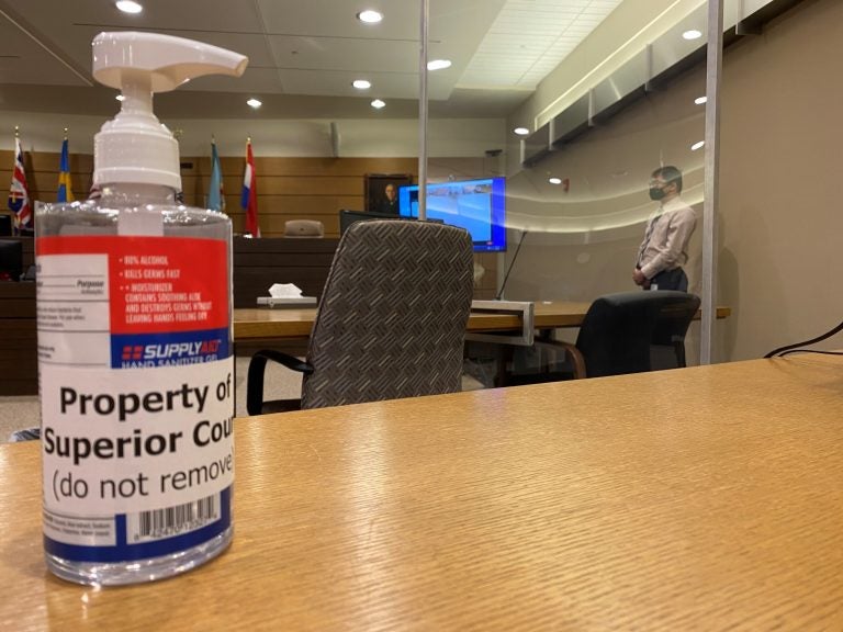 Plastic sheeting surrounds every juror's chair and separates tables for attorneys at the Leonard L. Williams Justice Center in downtown Wilmington as Delaware's courts prepare to resume criminal jury trials that had been on hold since March 2020. (Mark Eichmann/WHYY)