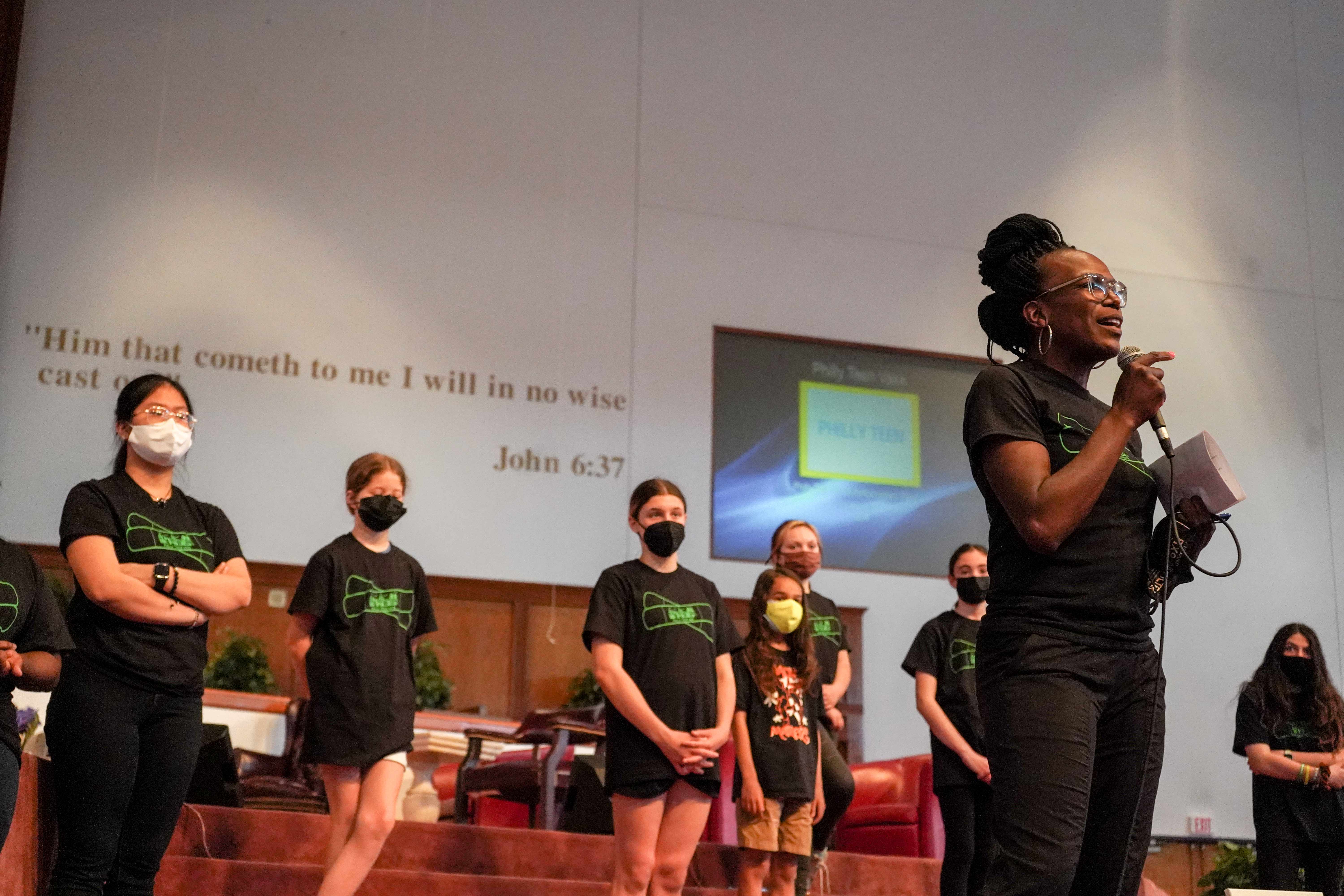 Dr. Ala Stanford, of the Black Doctors COVID-19 Consortium, speaks to the audience during a Philly Teen Vaxx clinic in North Philadelphia on May 15, 2021. (Kenny Cooper/WHYY)