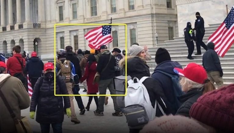 In this screengrab posted by an online account that's been identifying people present at the U.S. Capitol on Jan. 6, state Sen. Doug Mastriano (R-Adams), highlighted in a yellow box, appears to walk with a group of demonstrators parallel to the east steps of the Capitol building. (Screenshot)