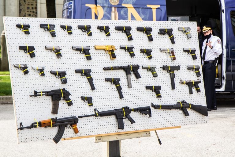 An ATF board displays some the types of firearms confiscated in Philadelphia. (Kimberly Paynter/WHYY)