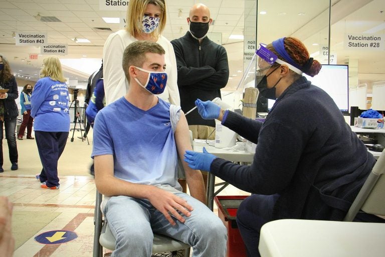 Donald Cucuzzella receives a COVID-19 vaccine