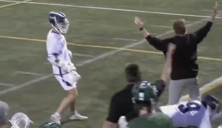 A local school district is apologizing after video captures a volunteer coach punching a player during a lacrosse game. (Screenshot)