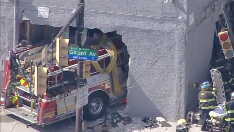 A fire truck crashed into a building at 7th Street and Girard Avenue Thursday afternoon. (Screenshot via 6ABC)