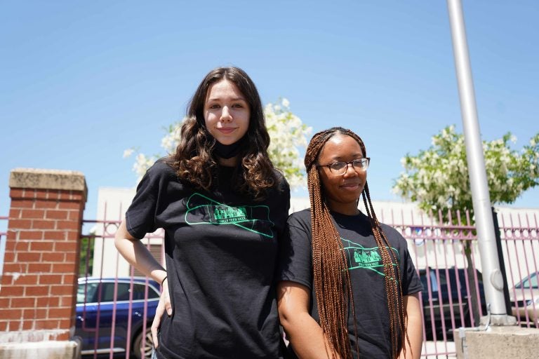 From left, Philly Teen Vaxx student ambassadors Nina Dilworth and Carmen Sackie. (Kenny Cooper/WHYY)