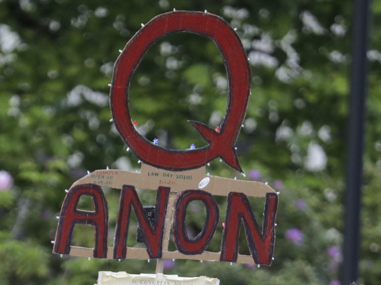 A QAnon sign is pictured outside
