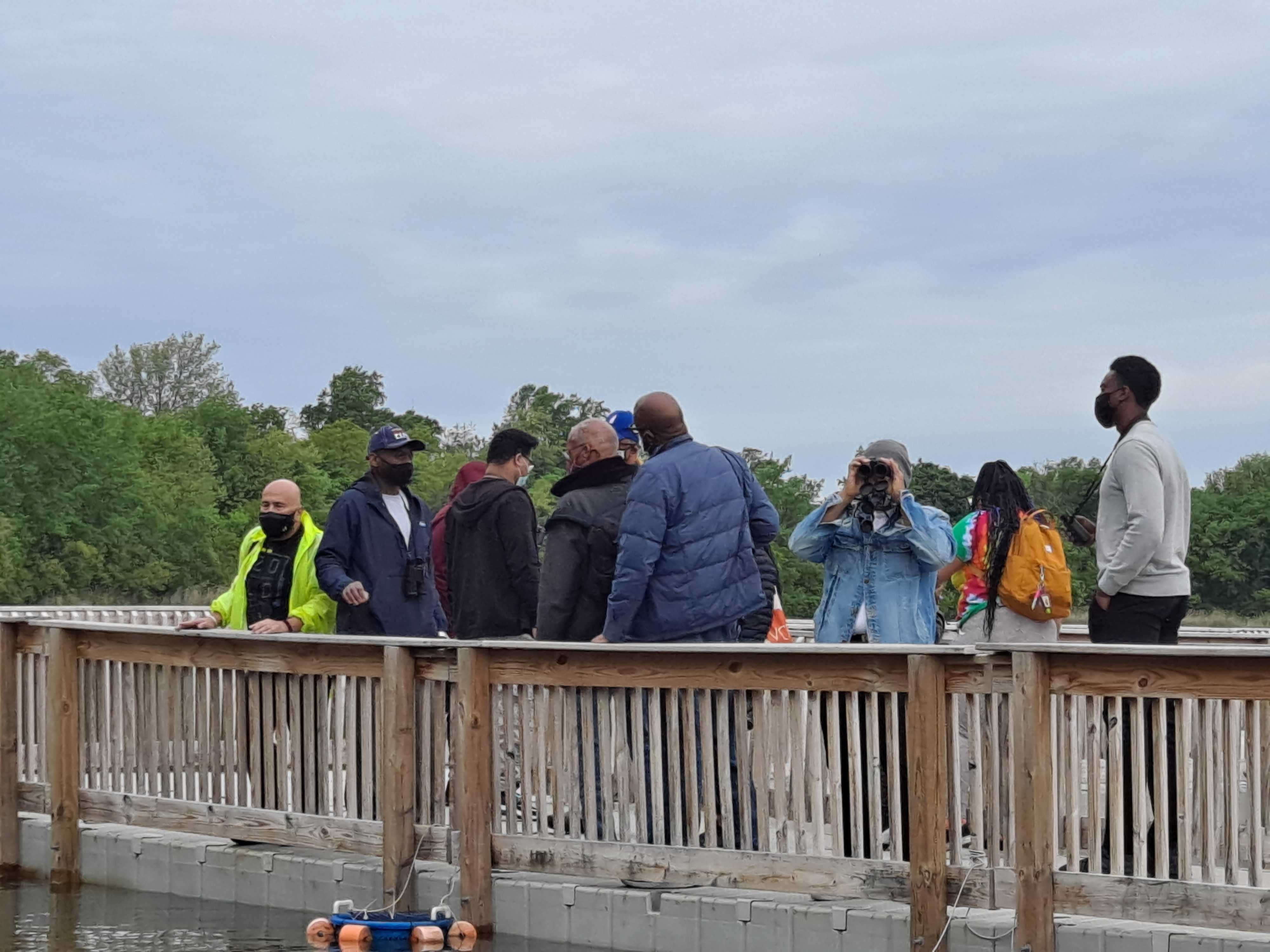 Keith Russell teaches people how to identify different birds around Fairmount Park.