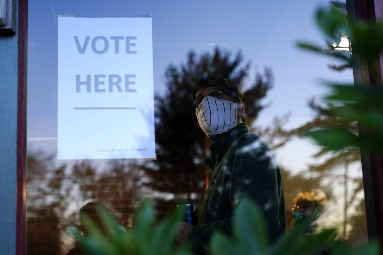 A voter lines up in a polling place to cast a ballot for the 2020 general election in the United States, Tuesday, Nov. 3, 2020, in Springfield, Pa. (Matt Slocum/AP Photo)