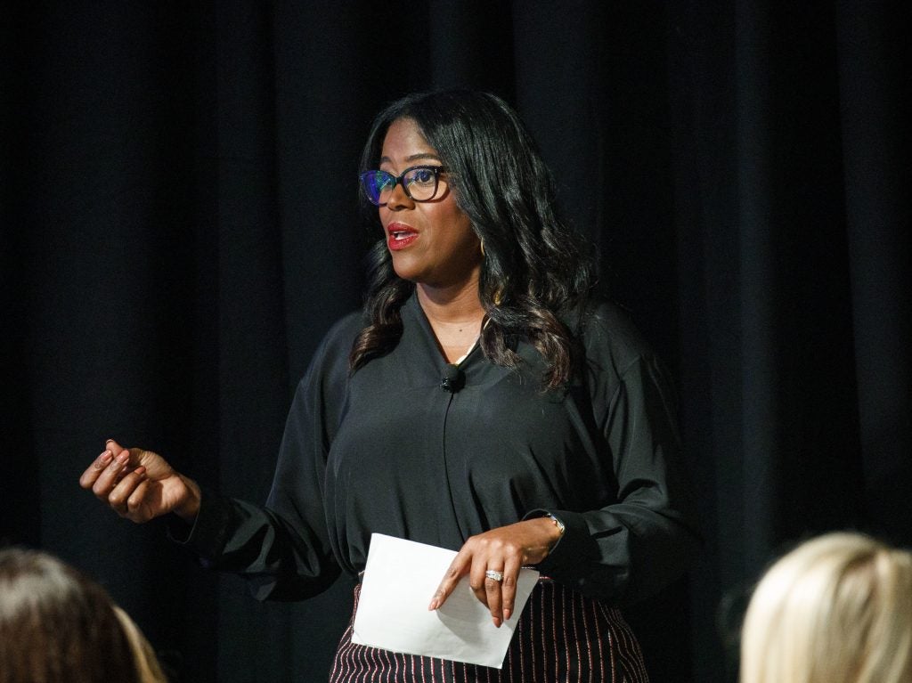 Thasunda Duckett, then an executive at JPMorgan Chase & Co., speaks during an investment conference in Dana Point, Calif., on Oct. 2, 2018. Duckett, currently the CEO of TIAA, says the Tulsa riots led to a erosion of trust by Blacks in the financial system. (Patrick T. Fallon/Bloomberg via Getty Images)