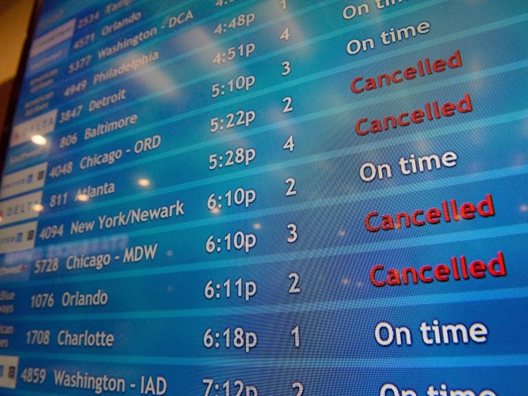 A screen shows canceled incoming flights at T.F. Green International Airport in Warwick, R.I., on March 30, 2020. Consumer advocates and two senators say airlines are sitting on nearly $15 billion in refunds owed to customers for canceled travel. (Joseph Prezioso/AFP via Getty Images)