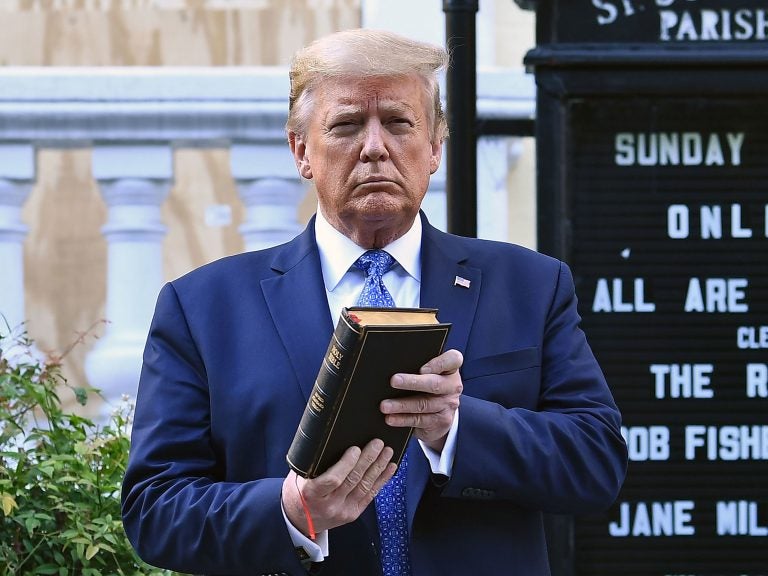 Then-President Donald Trump holds up a Bible outside St. John's Episcopal Church in Washington, D.C., during a controversial 2020 photo-op.
