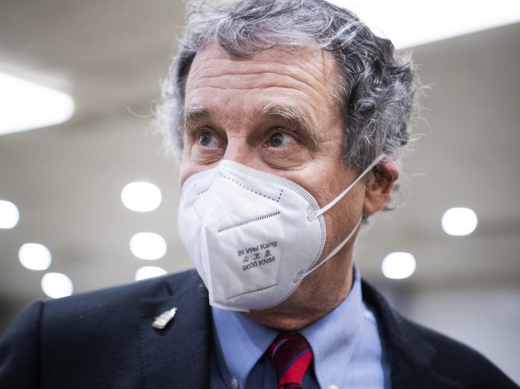 Sen. Sherrod Brown talks with reporters on Capitol Hill on Feb. 4. As chairman of the Senate Banking Committee, Brown has pledged to increase scrutiny of major banks. (Tom Williams/CQ-Roll Call, Inc via Getty Images)