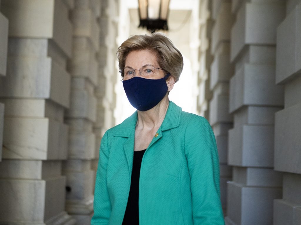 Sen. Elizabeth Warren heading to a news conference in Washington, D.C., on April 27. Warren, a member of the Senate Banking Committee, tells NPR that a key part of her job as a lawmaker will be oversight. Tom Williams/CQ-Roll Call, Inc via Getty Images